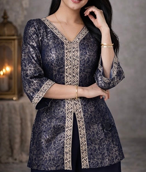 Elegant navy blue jacquard suit featuring intricate woven pattern with a refined contrast border , tailored in a flattering silhouette
